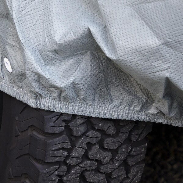 Grey SUV Or Full Size Trucks With Shell